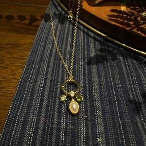 Elegant Gold and Silver Pendant Necklace
